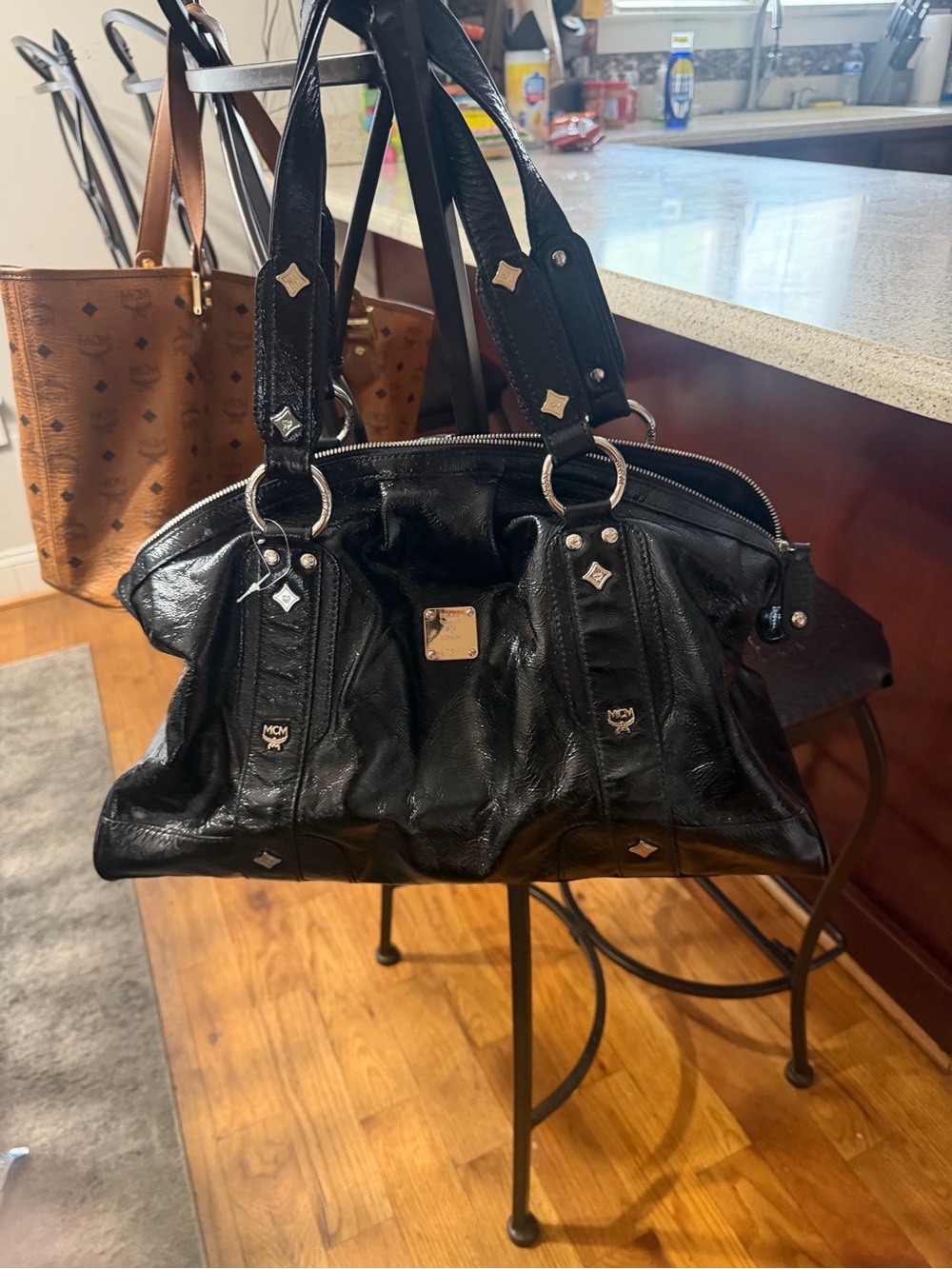 MCM Black Leather Shoulder Bag with Silver Accents